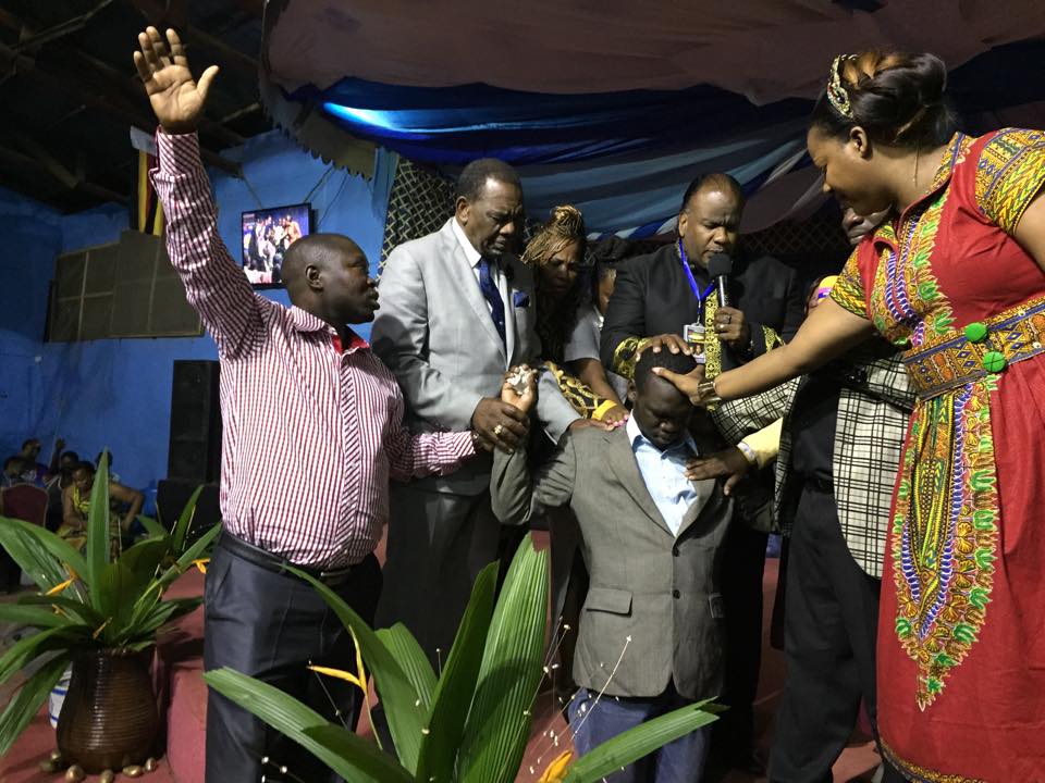 International Pastors praying for Kivumbi